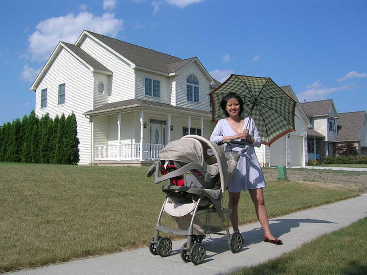 29. Mother and Son in the Fornt of Our Home